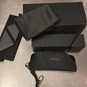 PRESS eyeglass case with box, wipes and extra box inside.